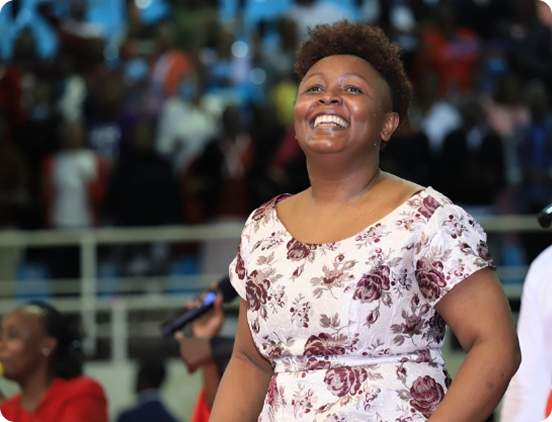A woman smiling during worship